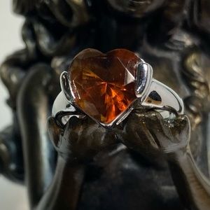 Silver tone women heart shape amber crystal ring. Size 10.5. Used.